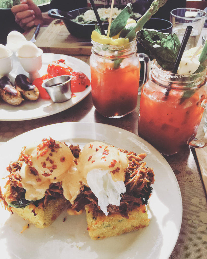 bloody mary, pulled pork on jalapeno bread with poached eggs